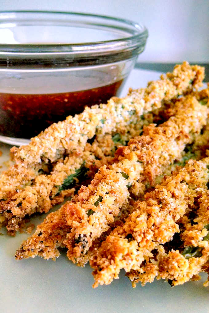 The trick to getting super crispy Oven-Fried Green Beans is toasting the panko. It gives that super crunchyfried taste without all that fat and oil making them a healthier version of the popular appetizer.