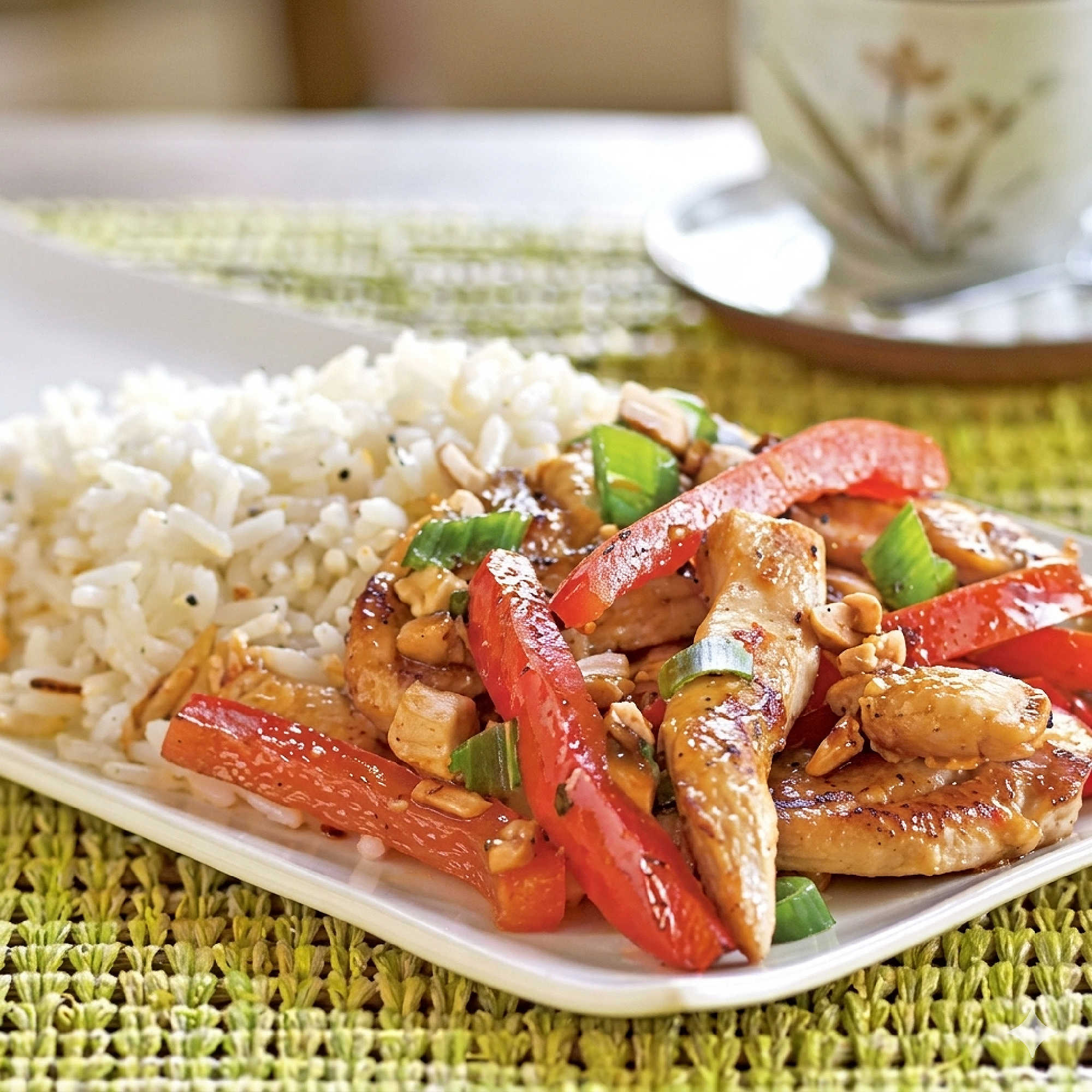 This chicken stir-fry dish balances salty, sweet, tangy, and spicy ingredients. Spoon it alongside a quick rice pilaf for the perfect meal.