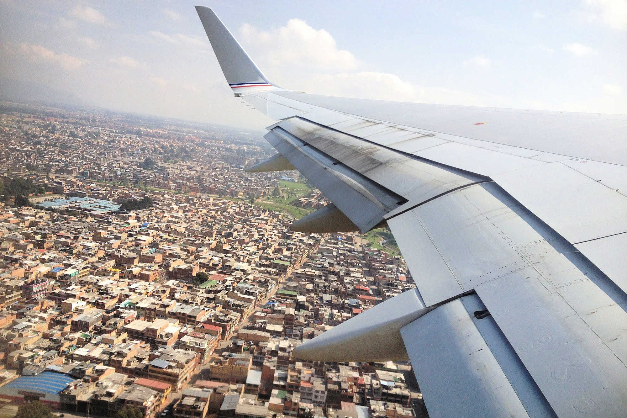 Bogota Colombia from the air through a plane window
