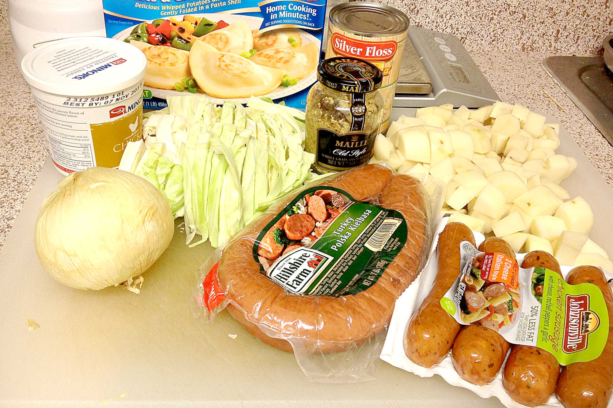 Nothing warms up a cool evening like a hearty plate of Beer Braised Sausage and Kraut. Savory sausage is slowly cooked with tangy sauerkraut and rich beer for a comforting meal that's perfect for any night of the week. #BeerBraisedSausage #KrautLovers #CraftBeerFoodie #HomemadeEats #FermentationNation #BraisedSausage #KrautLoversUnite #CraftBeerFood #SausageAndBeer #SlowCookedSausage