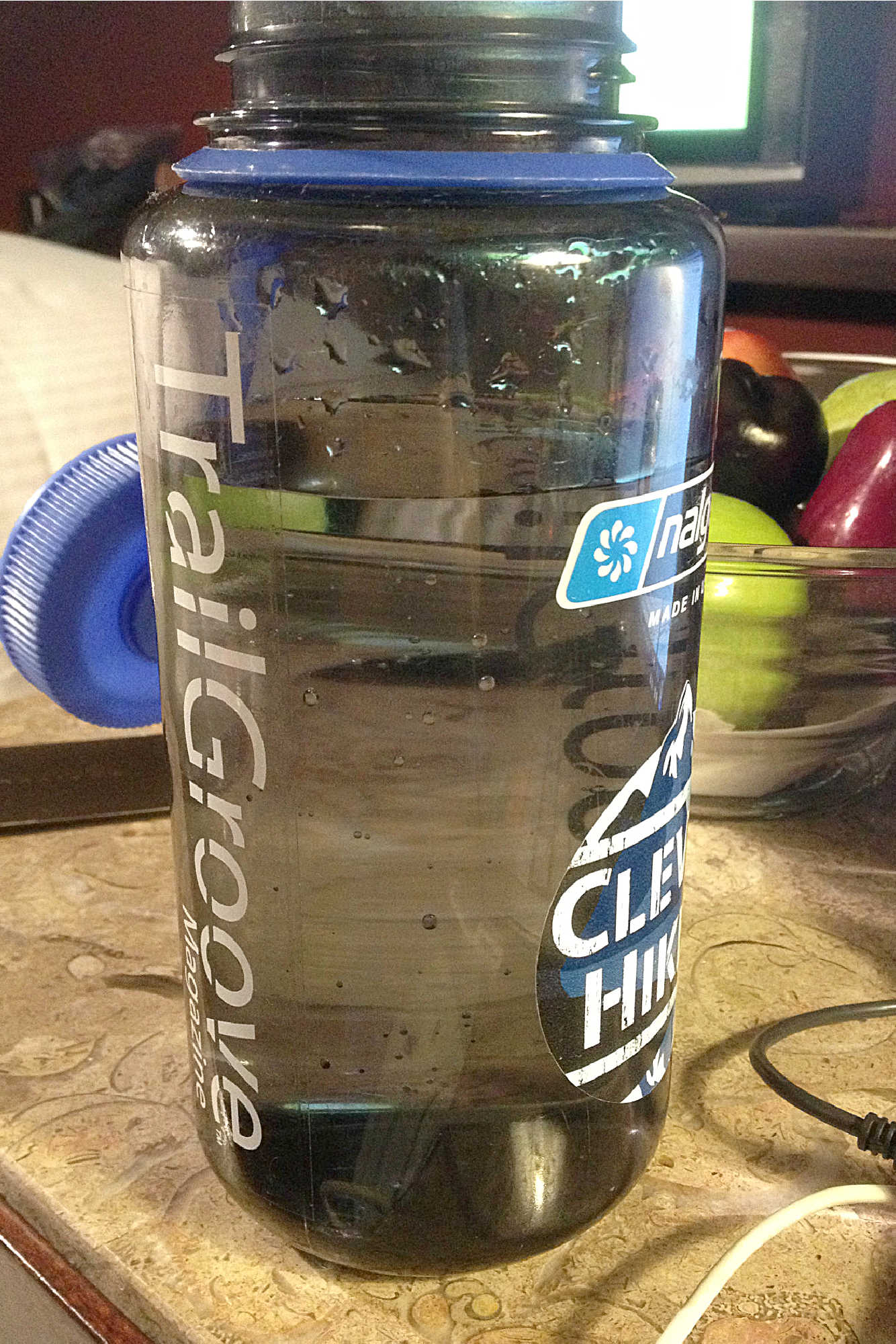 Nalgene bottle with water and stickers