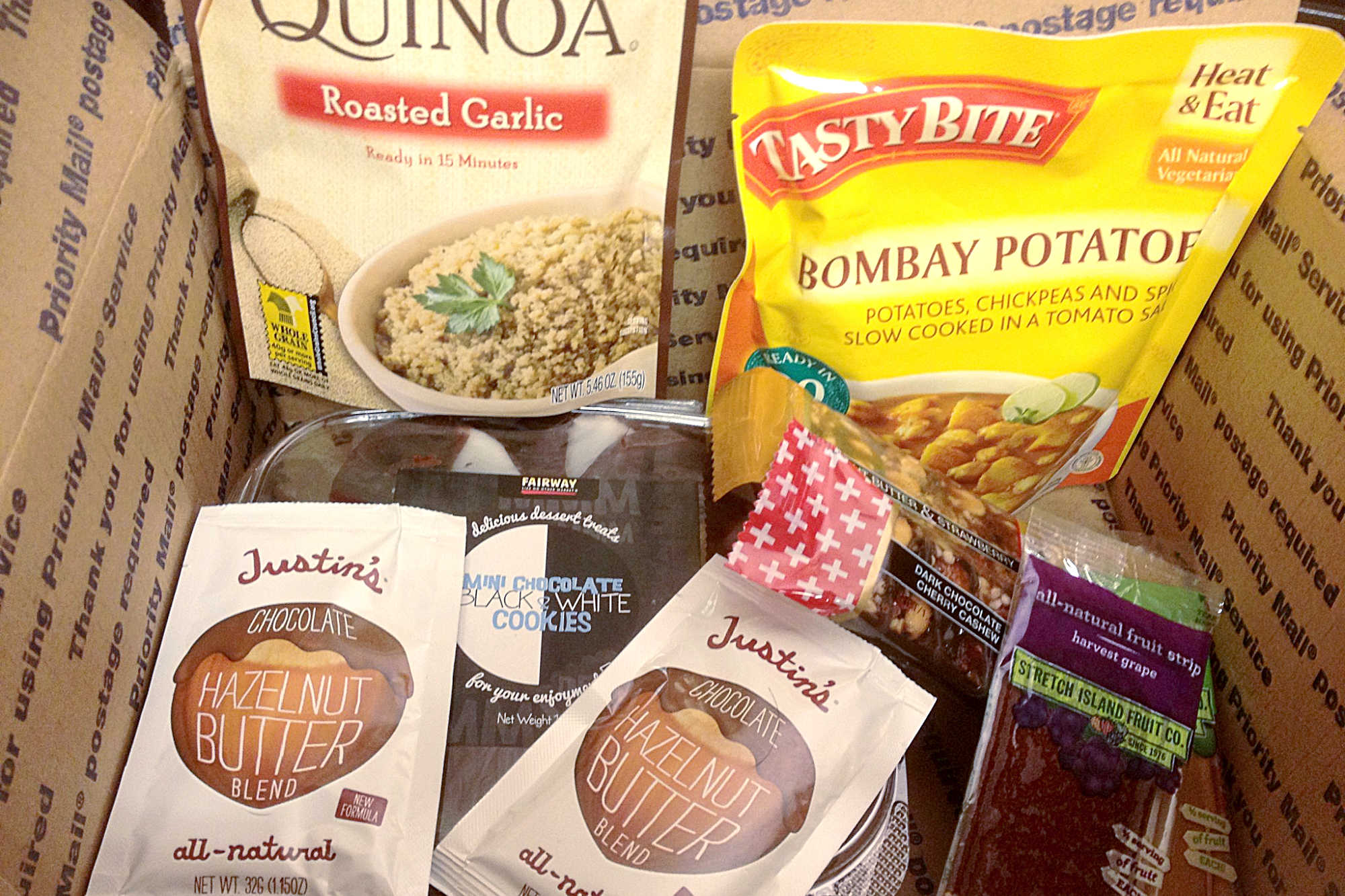 Foodie PenPals Reveal Day has mini cookies, fruit leather, bombay potatoes, quinoa, and delicious nut butter.