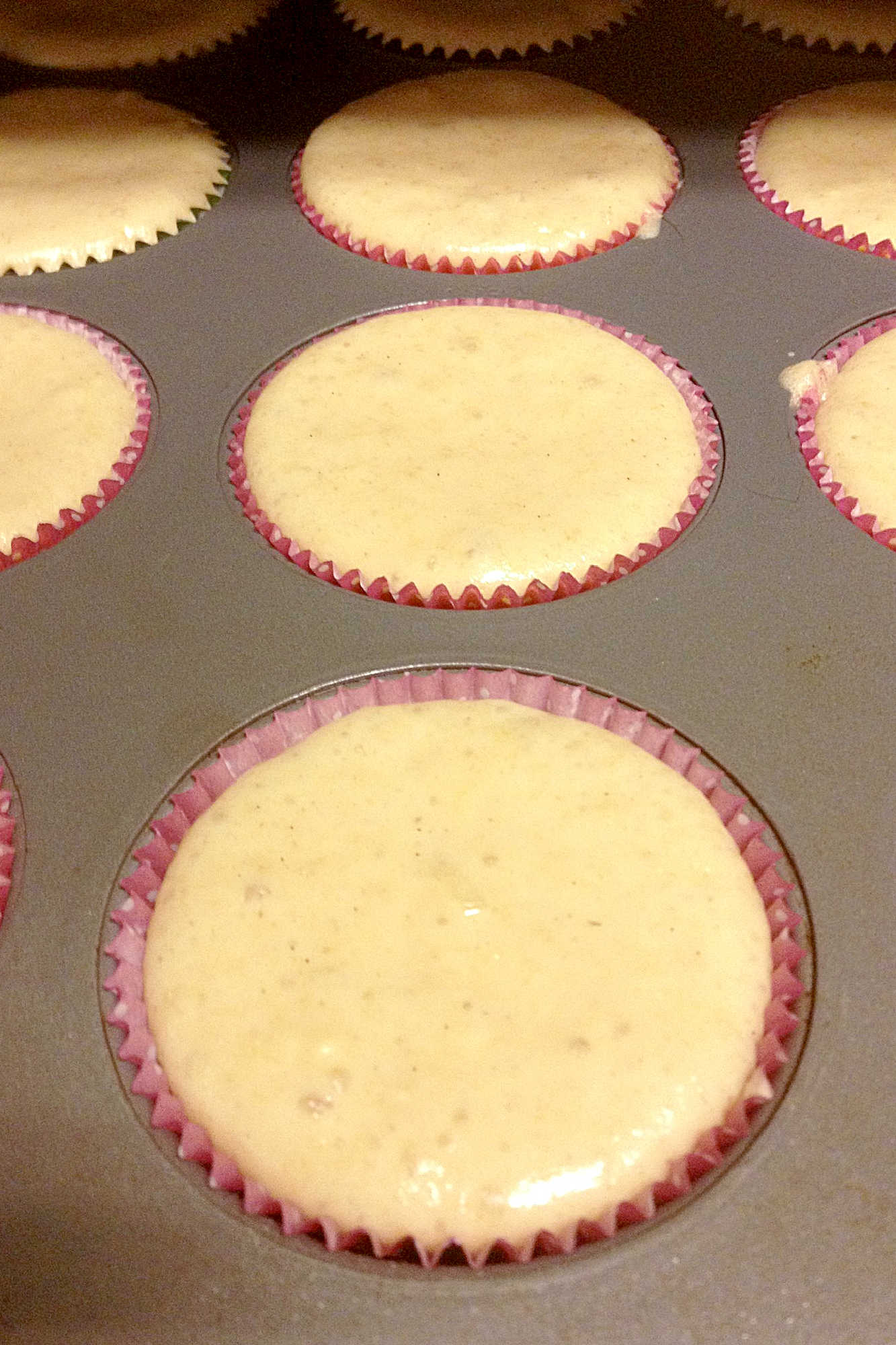 Can't make it to a tropical beach this summer? Bring the flavors of paradise to your kitchen with these delicious Pina Colada Cupcakes! #pineappleparadise #cupcakelove #tropicaltreats #coconutcravings #boozybites
