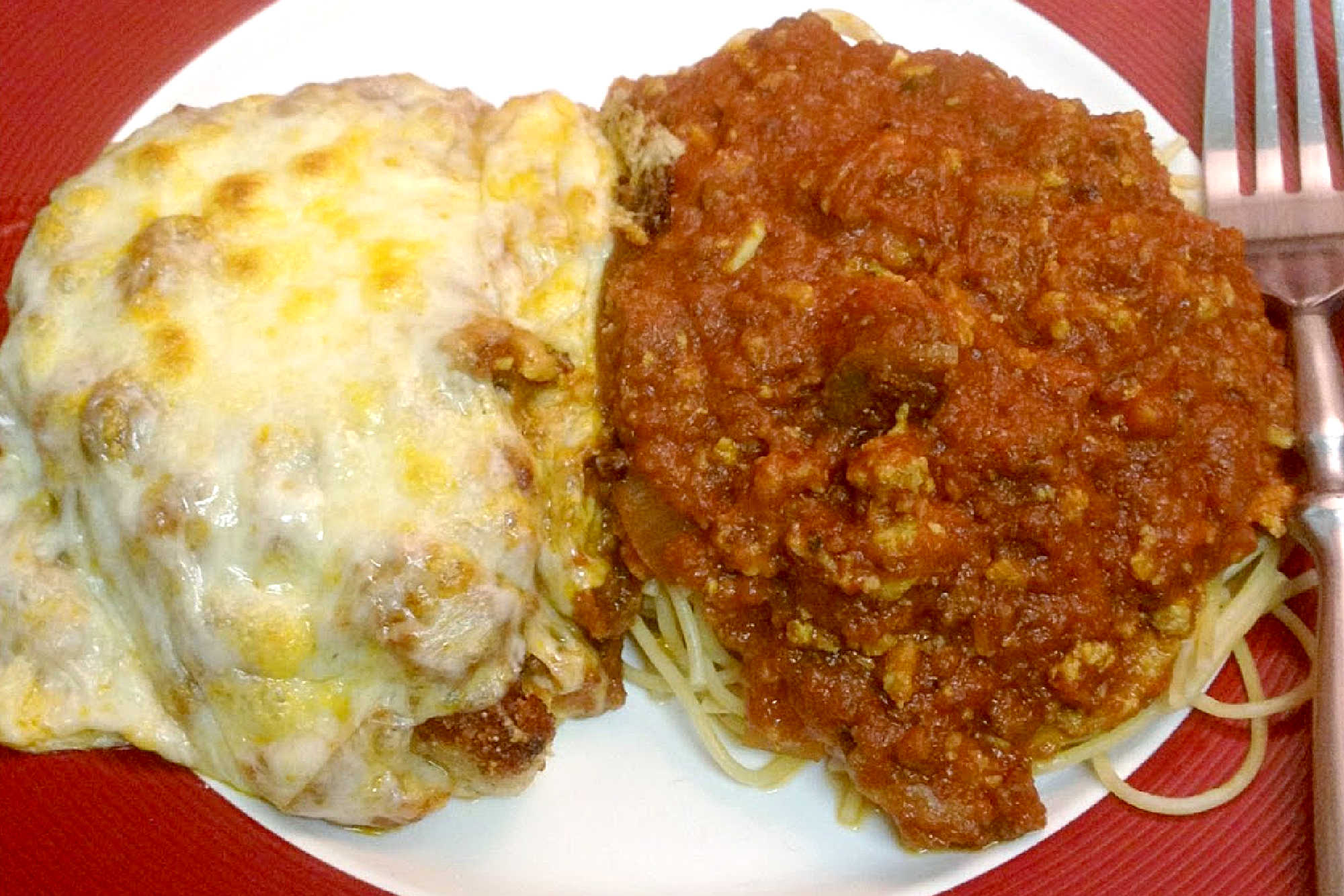 Mix things up and try pork parmesan tonight! Juicy pork cutlet + savory marinara + gooey mozzarella = perfection. 🍴 #PorkParmesanPerfection #ItalianComfortFood #DeliciouslySatisfying #WeeknightDinnerIdeas #ParmigianoPorkChops #porkparmesan #dinnerideas #foodie #dinnertime