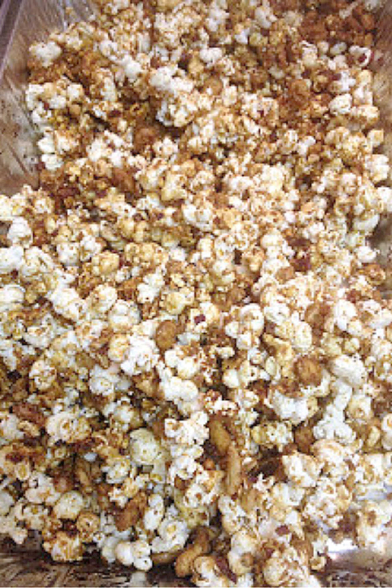 Beer bacon caramel corn brings together salty bacon, sweet caramel, and a hint of beer for a snack that's both surprising and satisfying. Try this unforgettable treat with your next movie night. #BeerBaconCaramelCorn #BrewsAndSnacks #CraftBeerTreats #PorkAndPoppinCandy #FoodieFavs
