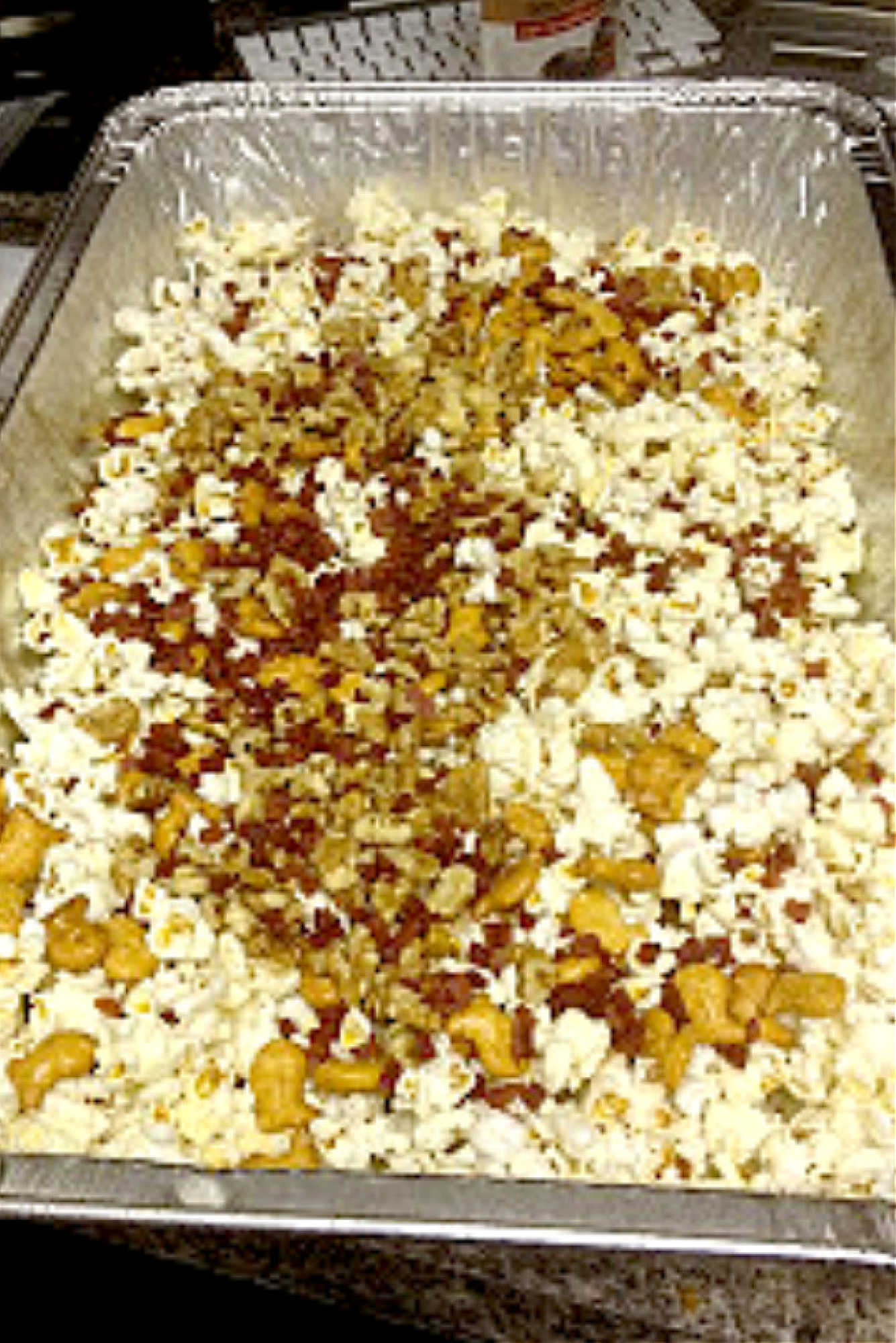 Beer bacon caramel corn brings together salty bacon, sweet caramel, and a hint of beer for a snack that's both surprising and satisfying. Try this unforgettable treat with your next movie night. #BeerBaconCaramelCorn #BrewsAndSnacks #CraftBeerTreats #PorkAndPoppinCandy #FoodieFavs