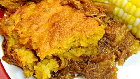 Southern style cornbread tops sweet and spicy barbecue chicken. Cornbread Crusted Barbecue Chicken Pie is easy to make and tastes like the south on a plate.