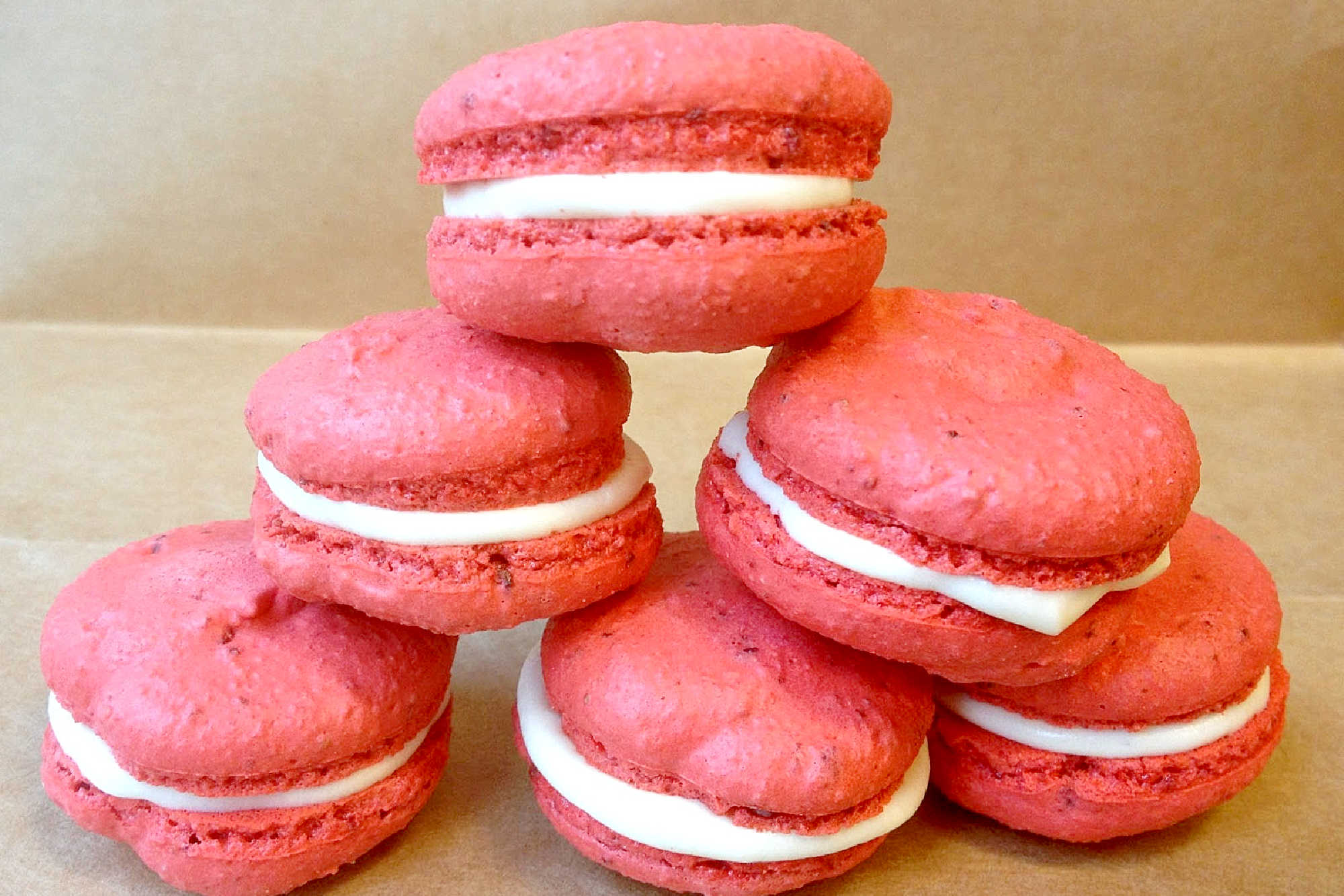 Life is like a box of Strawberries and Cream Macarons - sweet, surprising, and gone too soon! Treat yourself today because every moment is worth celebrating. #MacaronLoversUnite #StrawberryObsessed #CreamyDelights #FoodieFaves #DeliciouslySweetTreats #SweetLife #MacaronLove
