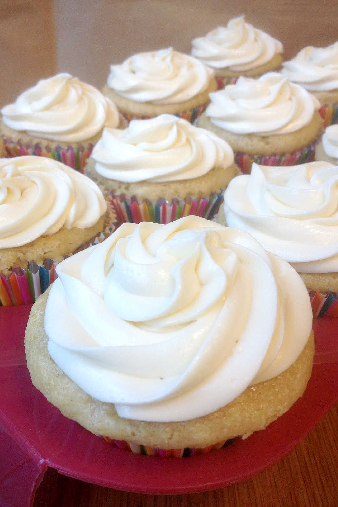 These vanilla cupcakes pair a sweet base filled with a swirl of blackberry curd and topped with a fluffy marshmallow buttercream. The perfect treat for fans of flavor variety. #CupcakeCreations #BlackberryDelight #MarshmallowMadness #DessertLoversUnite #BakedWithLove