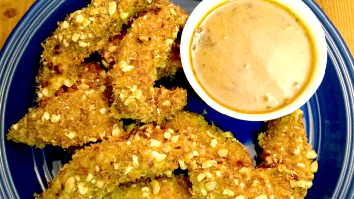Hands down.  This combination of toasted panko and peanuts is crunchy.  It's very crunchy.  It's crazy tasty crunchy!  Which makes these Crunchy Crusted Chicken Strips with Chipotle Honey Mustard super tasty crazy crunchy.