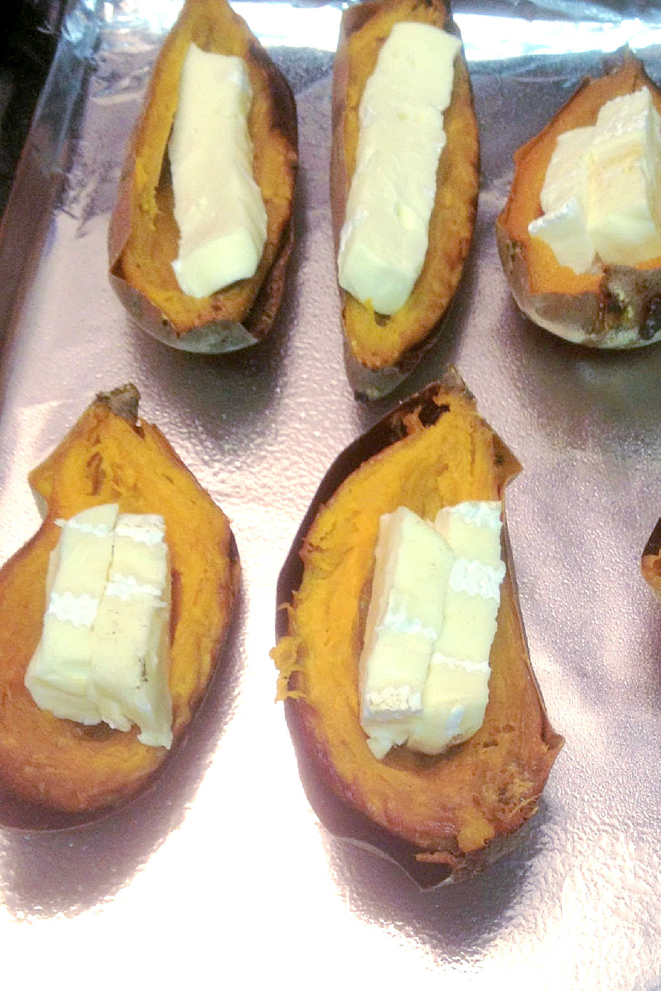 Turn sweet potatoes into a savory treat with this easy-to-follow sweet potato skins recipe. Ready in no time and sure to please a crowd. #sweetpotatoskins #healthyeats #vegetarianrecipes #foodporn #igfood