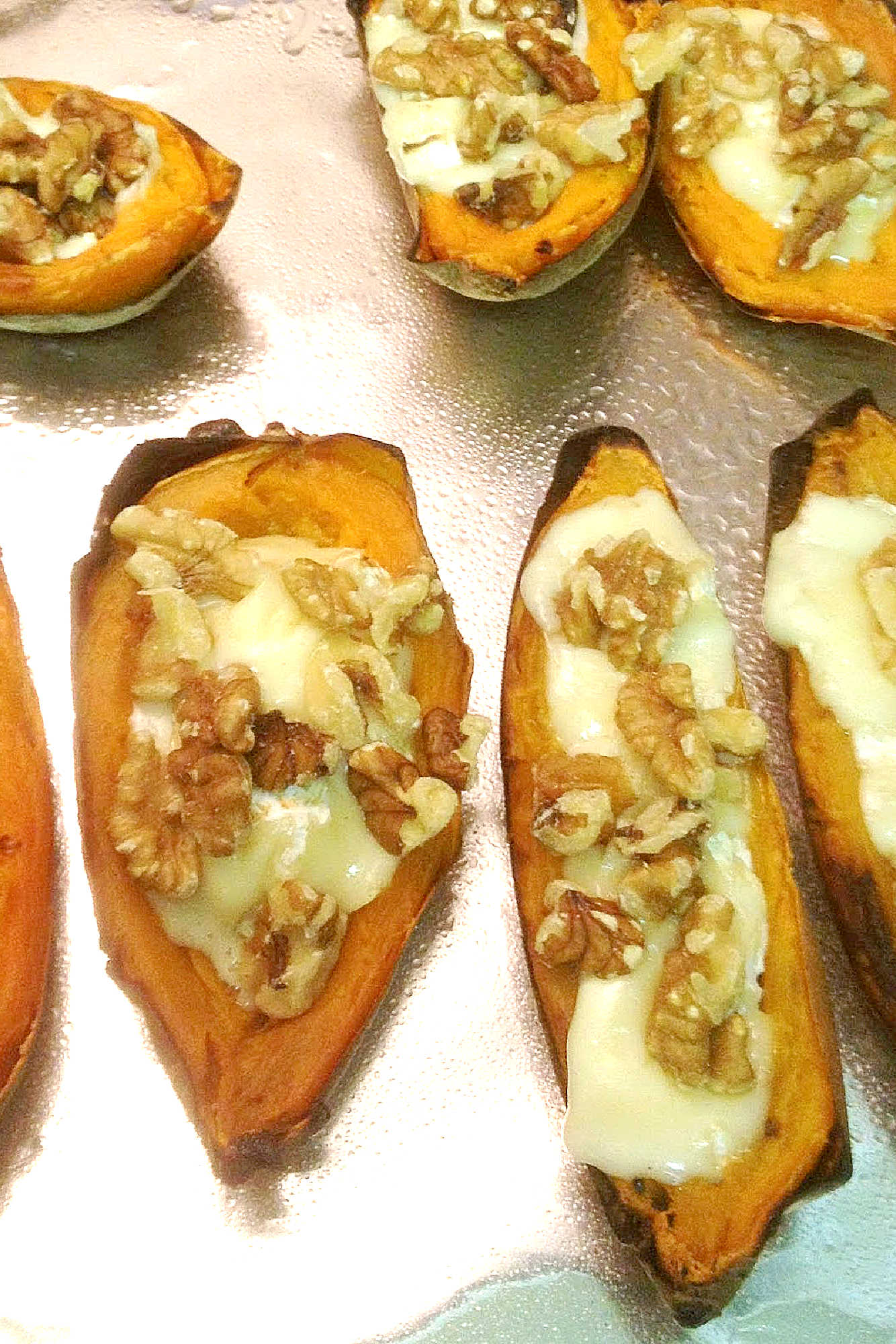 Turn sweet potatoes into a savory treat with this easy-to-follow sweet potato skins recipe. Ready in no time and sure to please a crowd. #sweetpotatoskins #healthyeats #vegetarianrecipes #foodporn #igfood