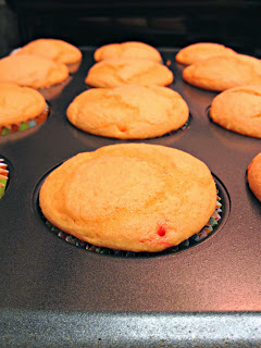 The popular cocktail is turned into these delicious cupcakes.  Tequila Sunrise Cupcakes have delicious orange flavor with a hint of cherry in the cake and tequila in the frosting.