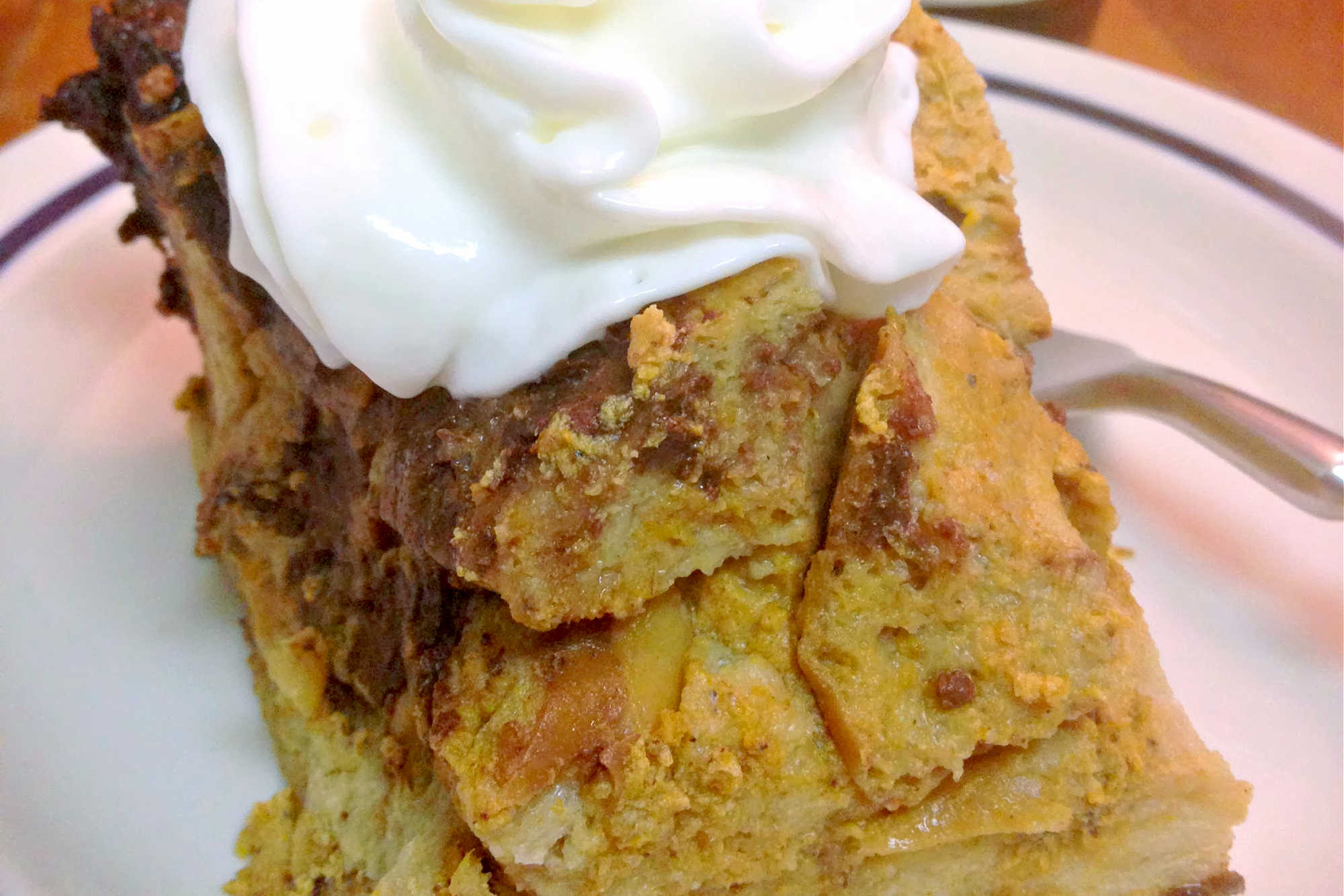Pumpkin Ale Brioche Bread Pudding blends soft brioche with the unique depth of pumpkin ale, creating a seasonal treat you won't forget. #PumpkinAleBreadPudding #FallBakingFrenzy #SeasonalSweets #CraftBeerDesserts #BriocheBreadPudding