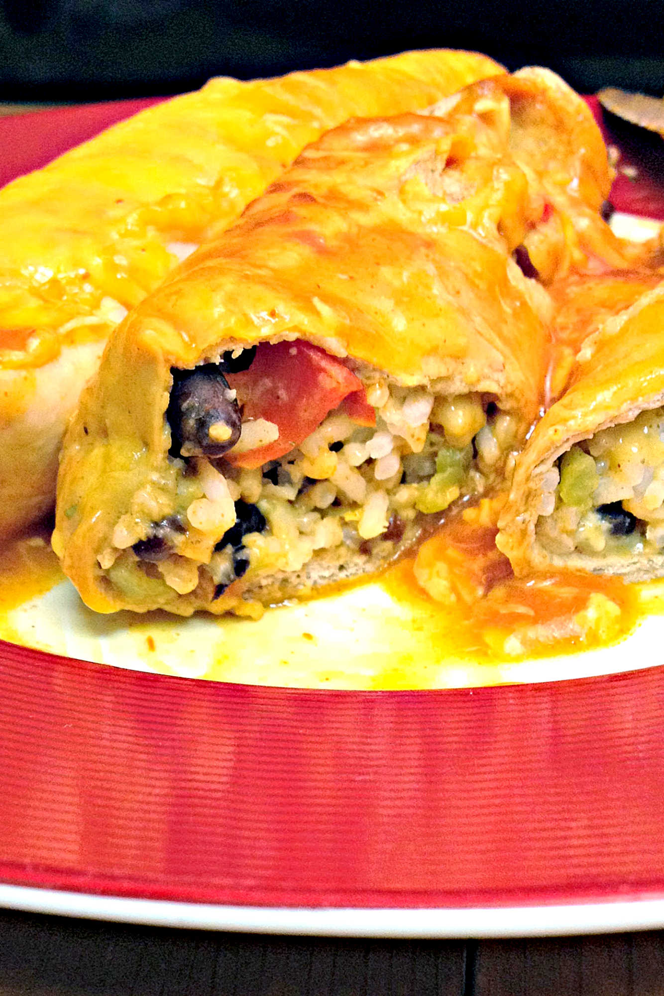 Roasted Pepper, Black Bean and Rice Enchiladas offer a blend of smoky peppers, creamy black beans, and fluffy rice inside warm tortillas. This recipe is simple to put together and perfect for anyone seeking a satisfying, meatless dinner option.  #MexicanFoodieDelights #VeganEnchiladaHeaven #PlantBasedComfortFood #EnchiladaObsession #SpicySavorySatisfaction