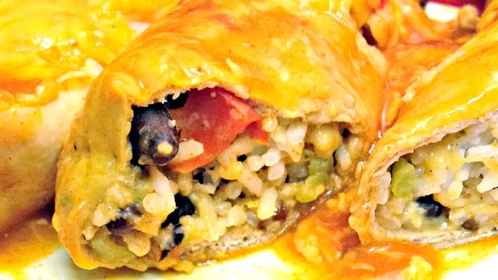 Roasted Pepper, Black Bean and Rice Enchiladas offer a blend of smoky peppers, creamy black beans, and fluffy rice inside warm tortillas. This recipe is simple to put together and perfect for anyone seeking a satisfying, meatless dinner option. #MexicanFoodieDelights #VeganEnchiladaHeaven #PlantBasedComfortFood #EnchiladaObsession #SpicySavorySatisfaction