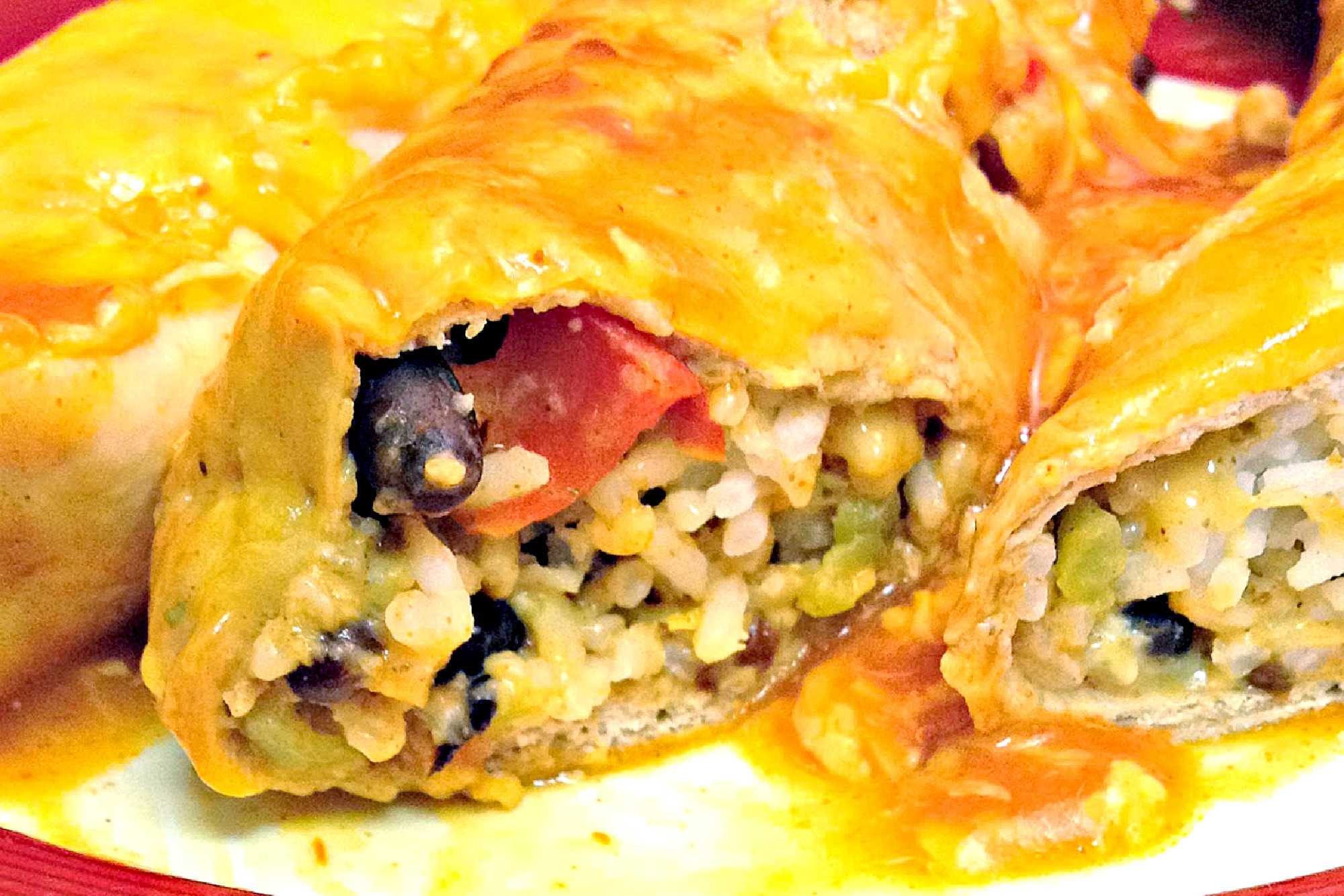 Roasted Pepper, Black Bean and Rice Enchiladas offer a blend of smoky peppers, creamy black beans, and fluffy rice inside warm tortillas. This recipe is simple to put together and perfect for anyone seeking a satisfying, meatless dinner option. #MexicanFoodieDelights #VeganEnchiladaHeaven #PlantBasedComfortFood #EnchiladaObsession #SpicySavorySatisfaction