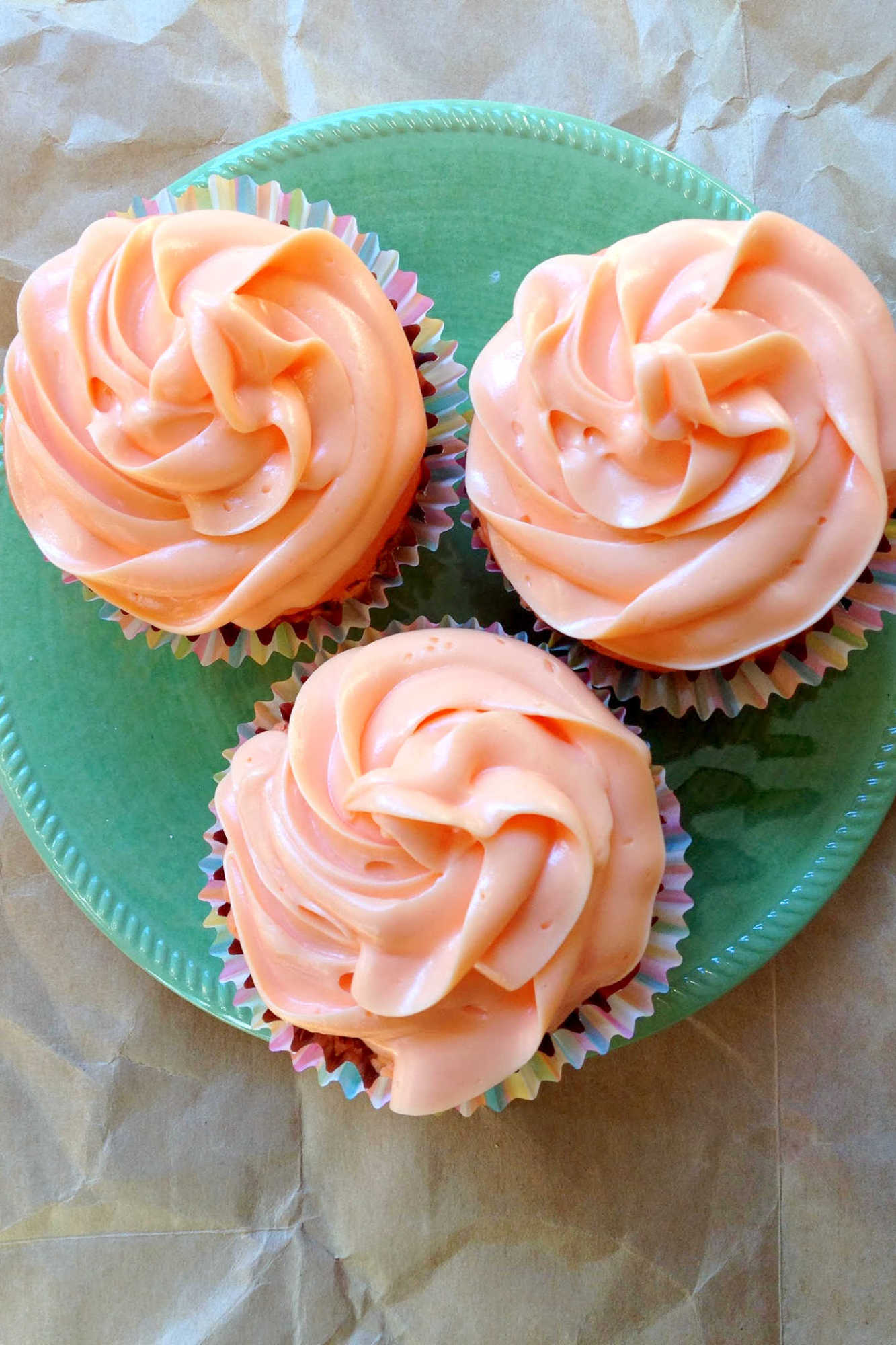 Turn an ordinary afternoon into an instant celebration with Tequila Sunrise Cupcakes. Sweet, fun, and just right for sharing at your next picnic or brunch. #tequilasunrisecupcakes #cupcakecreations #cocktailinspired #boozytreats #tequilaloversparadise