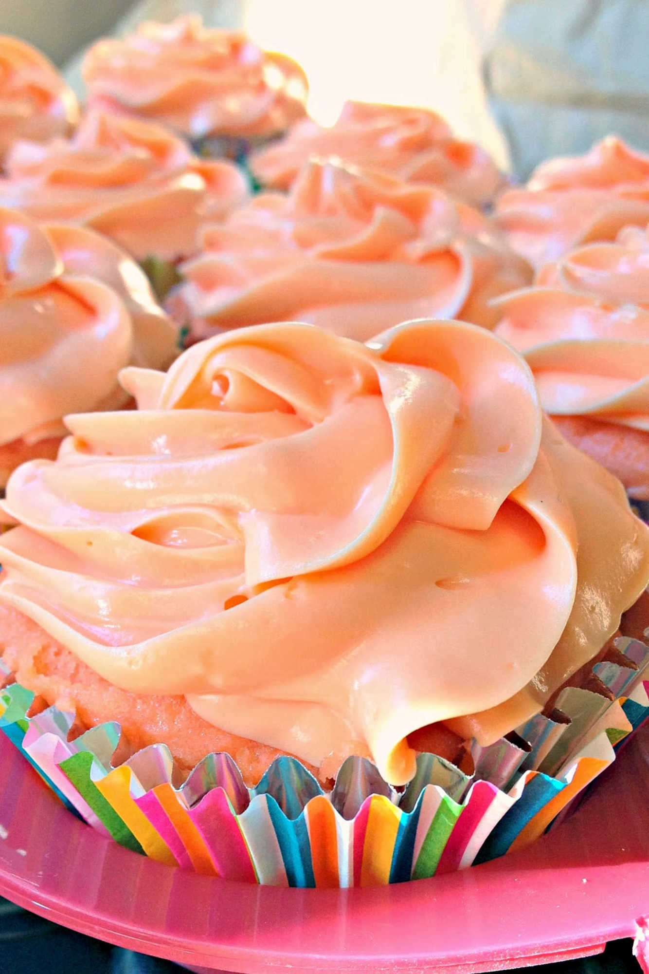 Turn an ordinary afternoon into an instant celebration with Tequila Sunrise Cupcakes. Sweet, fun, and just right for sharing at your next picnic or brunch. #tequilasunrisecupcakes #cupcakecreations #cocktailinspired #boozytreats #tequilaloversparadise
