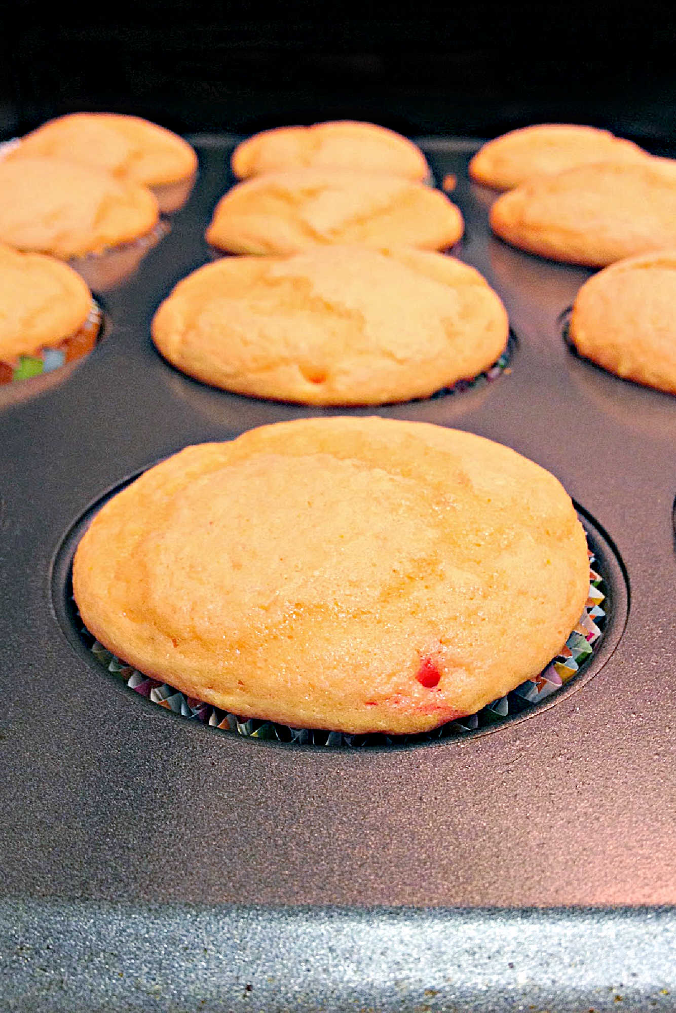 Turn an ordinary afternoon into an instant celebration with Tequila Sunrise Cupcakes. Sweet, fun, and just right for sharing at your next picnic or brunch. #tequilasunrisecupcakes #cupcakecreations #cocktailinspired #boozytreats #tequilaloversparadise