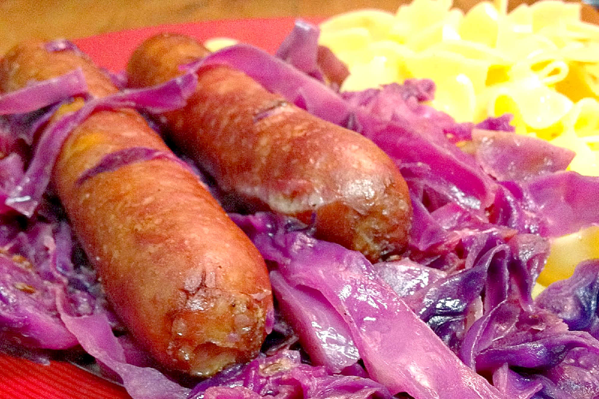 Enjoy a colorful and balanced dinner with Turkey Bratwurst with Purple Cabbage and Noodles. This dish brings comfort and flavor to busy weeknights while adding a vibrant touch to your table. #TurkeyBratwurstDelight #PurpleCabbageCrush #NoodleObsession #HealthyAndDeliciousEats #BratwurstLoversUnite #PurpleCabbagePower #HealthySausageSizzle