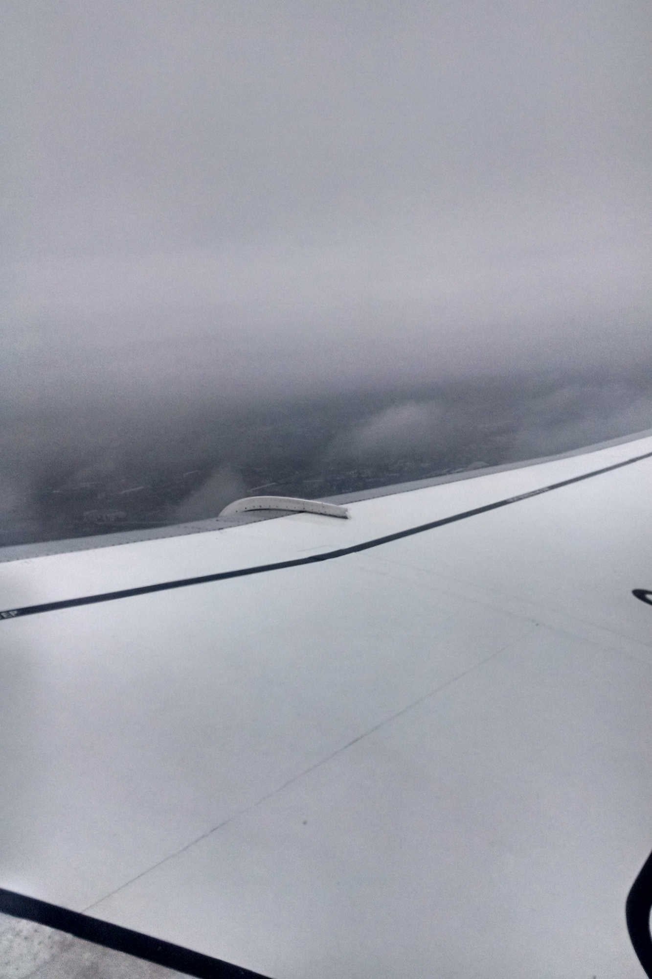 The Fog in Bosnia makes for an early departure home with a delicious soft pretzel, interesting coat hook, and interesting airline dinner.
