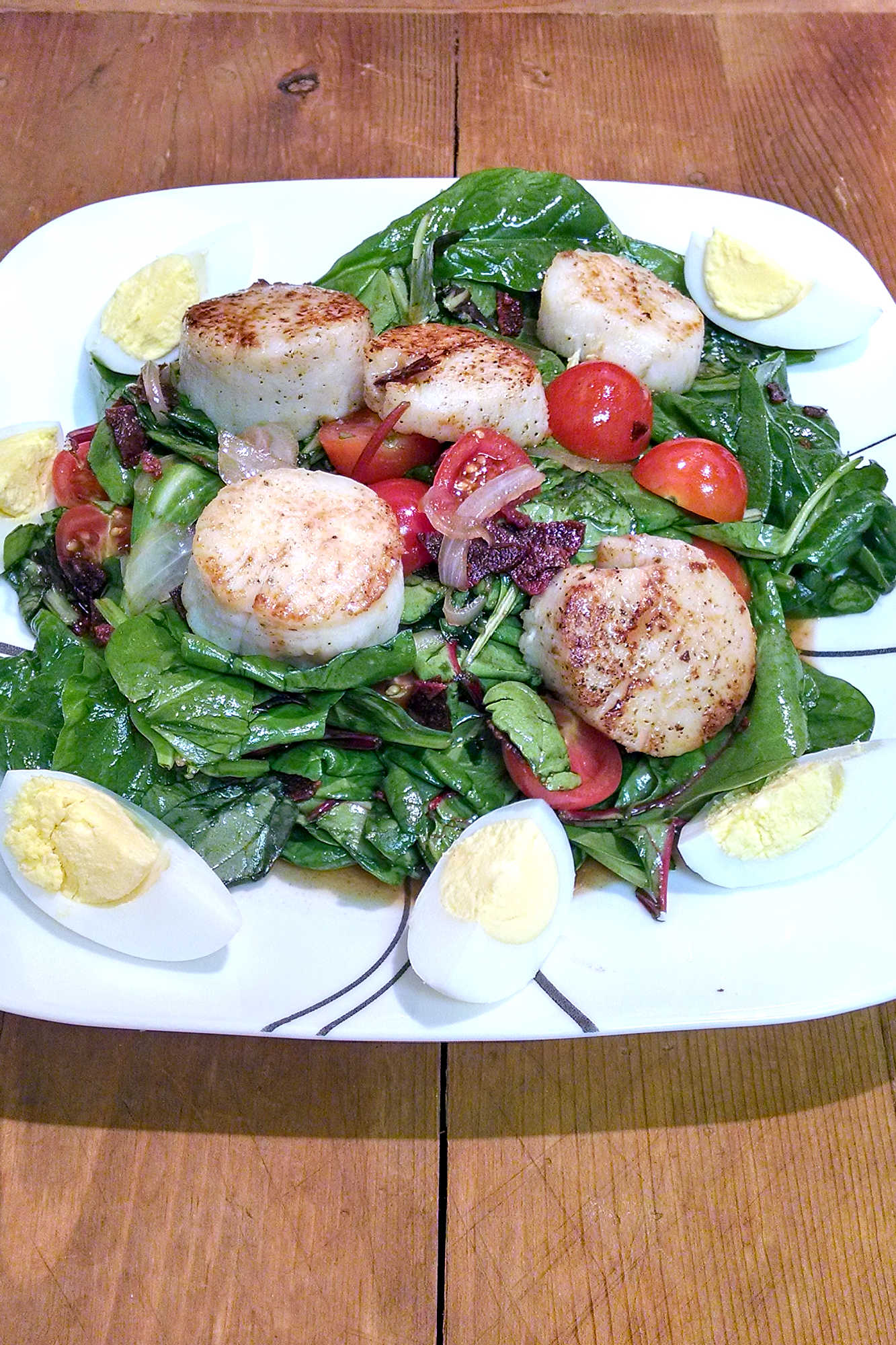 Forget boring old salads, it's time to level up with this BLTS Salad. Made with bacon, lettuce, tomato, and scallops it's sure to be a crowd-pleaser! #BaconLoversDelight #SaladGoals #FreshFromTheSea #TastetheOcean #FarmtoTableFridays #BLTScallopSalad #saladseries #FoodieFaves #SummerSalads #HealthyEats #SeafoodSensation #BaconLoversUnite #SavorySummer #Saladstagram #InstaSaladShare
