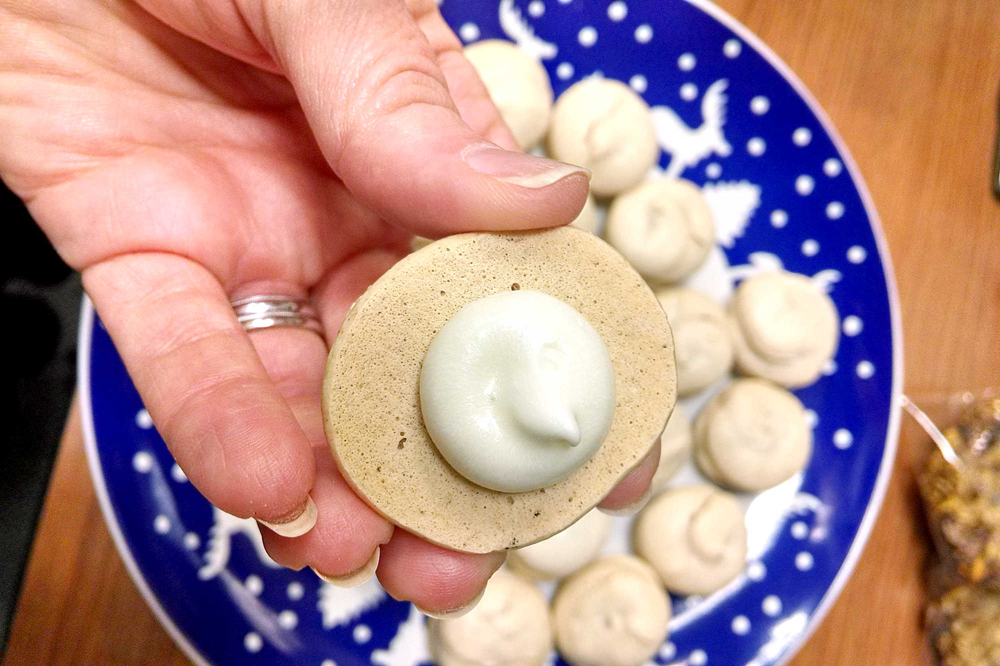 These are spicy goodness with some nice sweet and tart cream cheese filling.  Gingerbread Macaron with Brown Sugar Cream Cheese Filling are perfect for holiday baking. #GingerbreadCravings #MacaronMania #FestiveFilling #CreamyDelights #HolidayTreats
