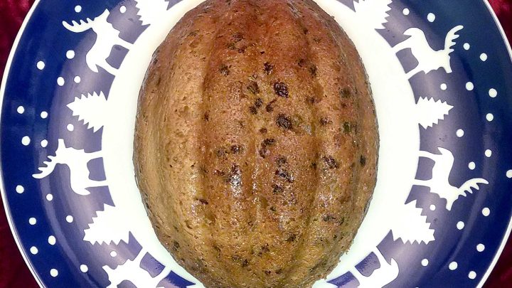 Tired of the same old holiday desserts? Try Mum Lowe's Christmas Pudding, an English inpsired steamed pudding. Filled with delicious fruit, raisins, and spices it was always on our holiday table and once you try this recipe it will be on yours, too! #ChristmasPuddingRecipe #FamilyRecipes #HolidayBaking #TraditionalDesserts #EasyHolidayCooking #Christmas #DessertIdeas #ChristmasTraditions #HolidayCooking #HolidaySweets #FestiveFlavors