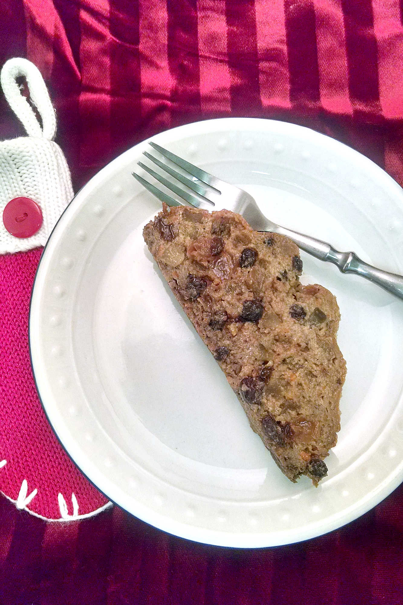 Tired of the same old holiday desserts?  Try Mum Lowe's Christmas Pudding, an English inpsired steamed pudding.  Filled with delicious fruit, raisins, and spices it was always on our holiday table and once you try this recipe it will be on yours, too! #ChristmasPuddingRecipe #FamilyRecipes #HolidayBaking #TraditionalDesserts #EasyHolidayCooking #Christmas #DessertIdeas #ChristmasTraditions #HolidayCooking #HolidaySweets #FestiveFlavors