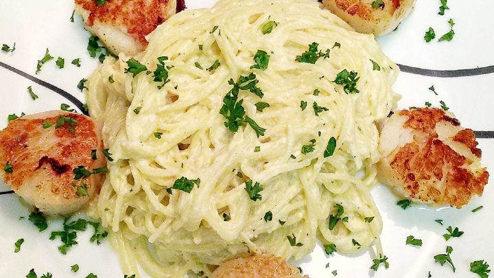 Ricotta Carbonara with seared scallops is the perfect marriage of flavors. The succulently sweet scallops and the creamy carbonara are a heavenly combination of flavors. #RicottaCarbonara #Scallops #FoodieHeaven #Scallops #LuxuryEats #RicottaCarbonara #ScallopsTwoWays #PastaPerfection #SeafoodLoversUnite #HomemadeDinnerDelights