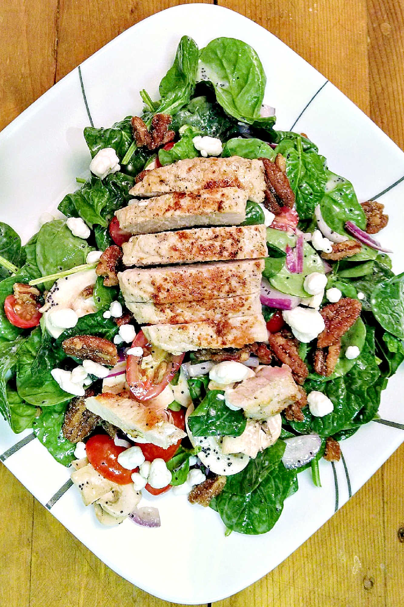 Switch up your salad game and make Spinach Salad with Pork. It is the perfect combo of moist and delicious pork, leafy greens, and pomegranate vinaigrette. #porkloversparadise #healthygreensalad #spinachobsession #eatyourgreens #foodforfuel #SpinachSensation #HealthyEatsDaily #SaladLoversUnite #LeafyGreens #SpinachSalad #Pork #Delicious #HealthyEating #PorkSalad #Yum #HealthyEats #Spinach #PorkPower