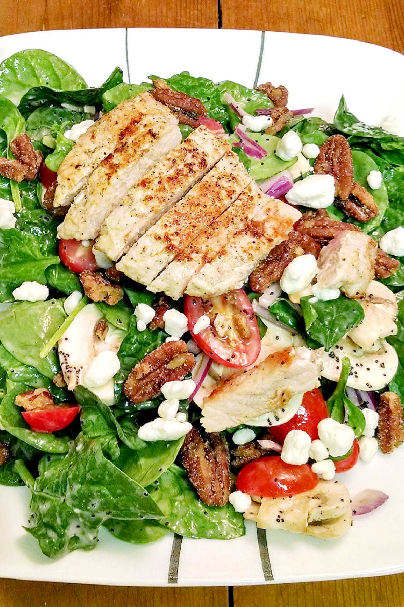 Switch up your salad game and make Spinach Salad with Pork. It is the perfect combo of moist and delicious pork, leafy greens, and pomegranate vinaigrette. #porkloversparadise #healthygreensalad #spinachobsession #eatyourgreens #foodforfuel #SpinachSensation #HealthyEatsDaily #SaladLoversUnite #LeafyGreens #SpinachSalad #Pork #Delicious #HealthyEating #PorkSalad #Yum #HealthyEats #Spinach #PorkPower