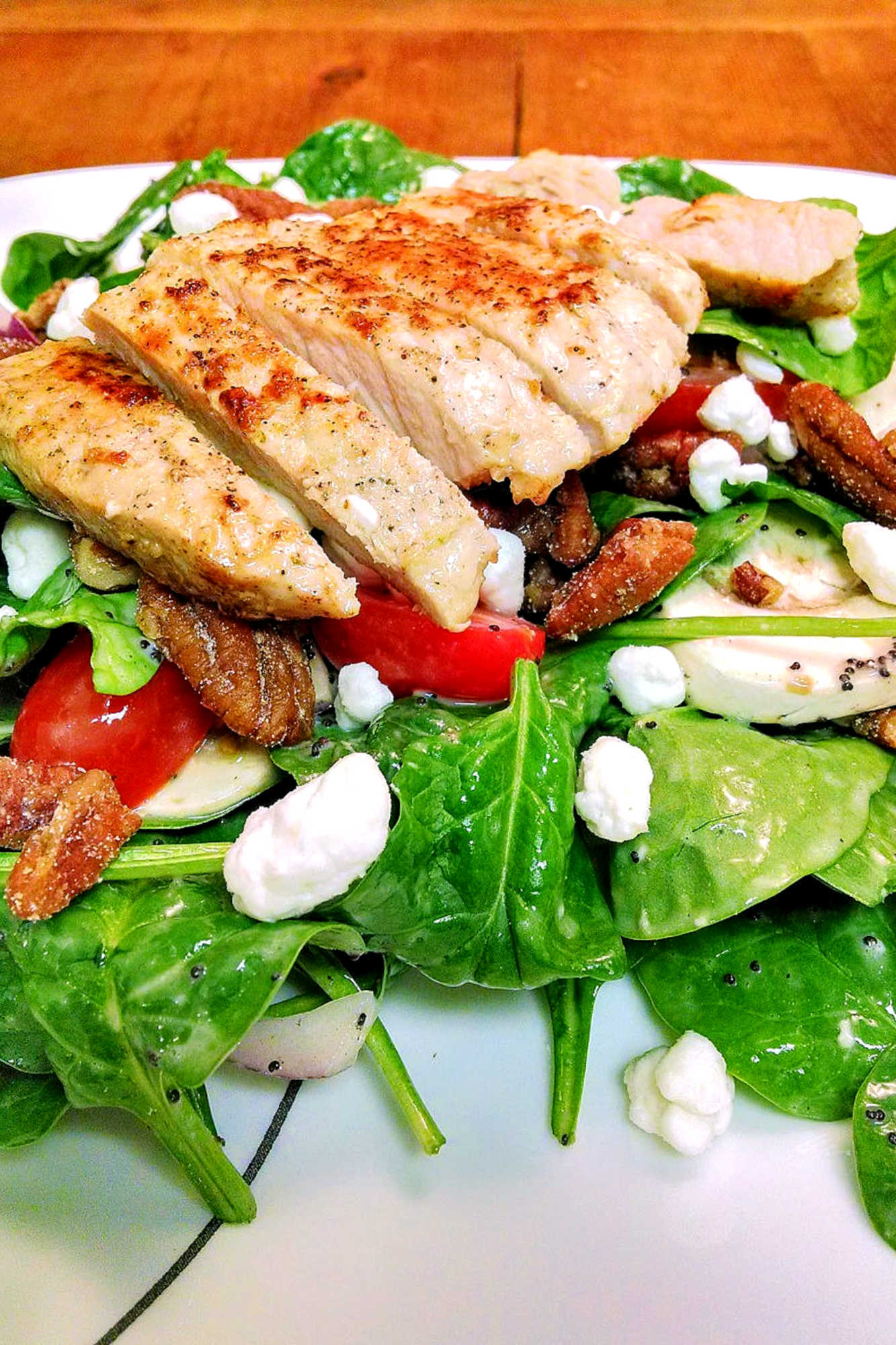 Switch up your salad game and make Spinach Salad with Pork. It is the perfect combo of moist and delicious pork, leafy greens, and pomegranate vinaigrette. #porkloversparadise #healthygreensalad #spinachobsession #eatyourgreens #foodforfuel #SpinachSensation #HealthyEatsDaily #SaladLoversUnite #LeafyGreens #SpinachSalad #Pork #Delicious #HealthyEating #PorkSalad #Yum #HealthyEats #Spinach #PorkPower