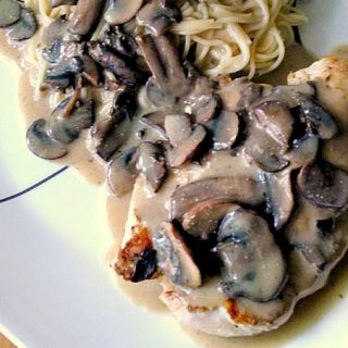 This Chicken and Marsala Cream Sauce is creamy and delicious!!  You will want some bread to sop of all that deliciousness when you're diving into this dish.