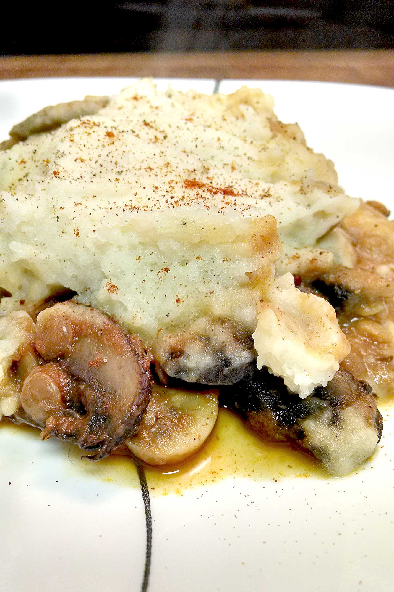 A hearty and meat free version of the traditional classic, Mushroom and Lentil Cottage Pie won't have you missing the meat.  It's packed with hearty goodness and tons of flavor! #meatfree #meatless #cottagepie