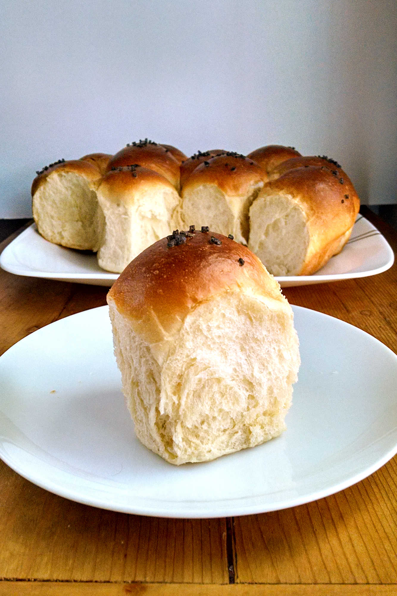 These Classic Dinner Rolls are soft, simpler, and easily to make for any dinner. You can make them ahead of time, freeze, and then pop them into the oven to have for dinner. #breadbaking #homemadeholidays #freshfromtheoven #yeastdoughlove #carbsarelife #homemadebread #bakingfromscratch #foodphotography #yeastlove #carbsarelife