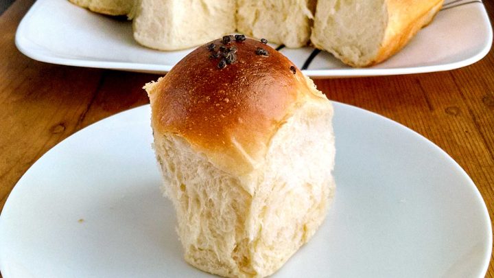 These Classic Dinner Rolls are soft, simpler, and easily to make for any dinner. You can make them ahead of time, freeze, and then pop them into the oven to have for dinner. #breadbaking #homemadeholidays #freshfromtheoven #yeastdoughlove #carbsarelife #homemadebread #bakingfromscratch #foodphotography #yeastlove #carbsarelife