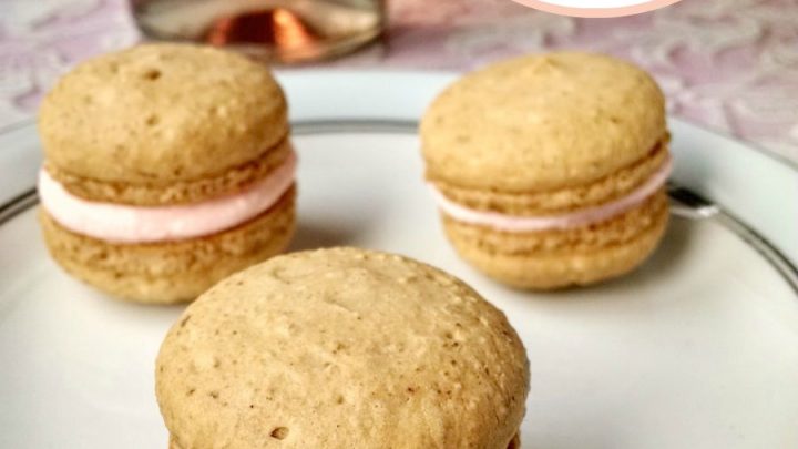 These delicate little Strawberry Macaron with Pink Moscato Buttercream for #NationalMoscatoDay pack a delicious flavor from the strawberries in the shells and the pink Moscato in the buttercream. Perfect for any special occasion.