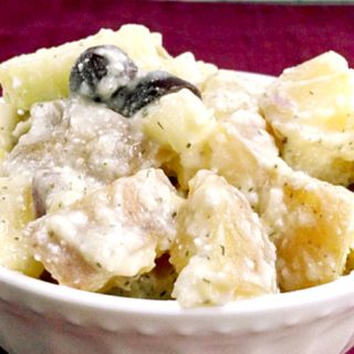 Greek Style Potato Salad is a cool, summery, potato salad with delicious tzatziki sauce, salty kalamatas and tangy feta. Oh yeah. Greek Style Potato Salad does taste THAT good.