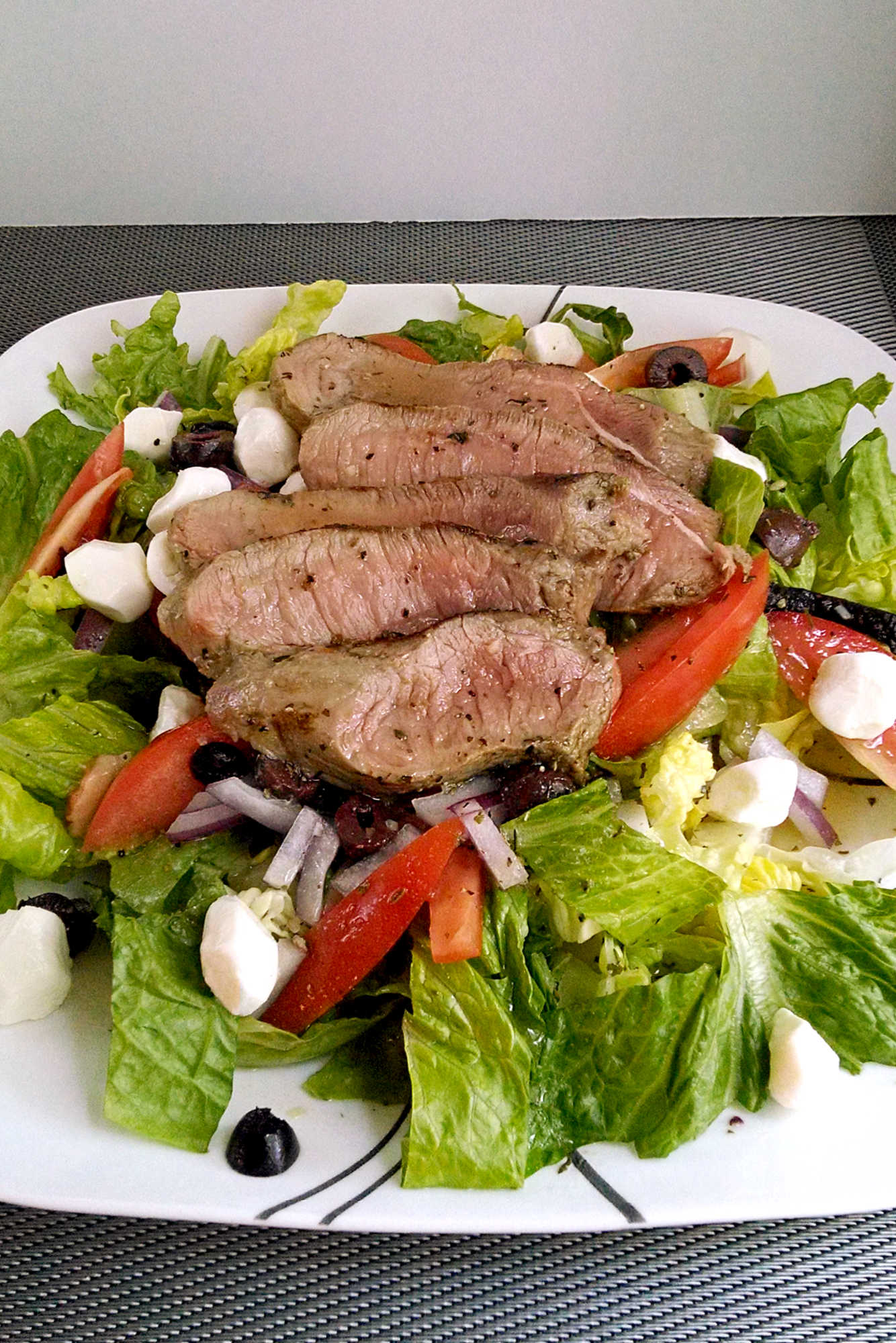 Indulge in a taste of Italy with this Steak Caprese Salad.🥩🥗 Bursting with fresh mozzarella, ripe tomatoes, and tangy balsamic, this dish will transport your taste buds to the streets of Rome. #SteakCapreseSalad #SaladLoversUnite #FoodieFinds #GourmetGrub #Foodie #ItalianDelight #SteakCapreseSalad #SteakLovers #HealthyEats #FoodieFavs #SummerSaladSensation