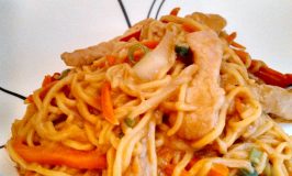 A quick and tasty noodle based stir fry that is smothered in a sweet and spicy peanut butter based sauce. This Asian Noodles with Peanut Dressing is perfect for a weeknight travel meal.