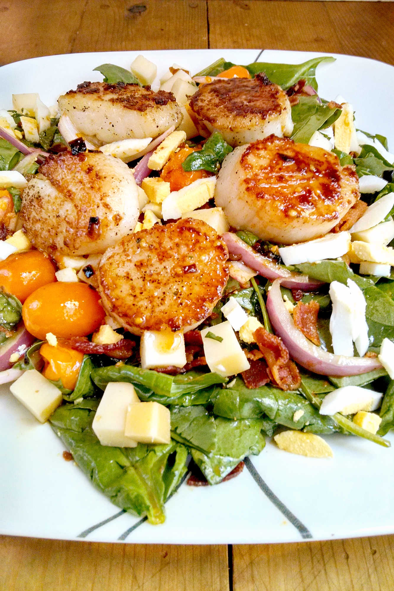 Upgrade your routine with Blistered Tomato Salad with Pan Seared Scallops. This quick, restaurant-worthy dish fits easily into busy lifestyles while offering bright and satisfying flavors.  #saladlove #scallopsfordays #foodiefinds #summerfood #seafoodlovers #saladgoals #TomatoSaladGoals #SeafoodLoverEats #ScallopsandGreens #HealthyFoodieFinds #SummerSaladCravings
