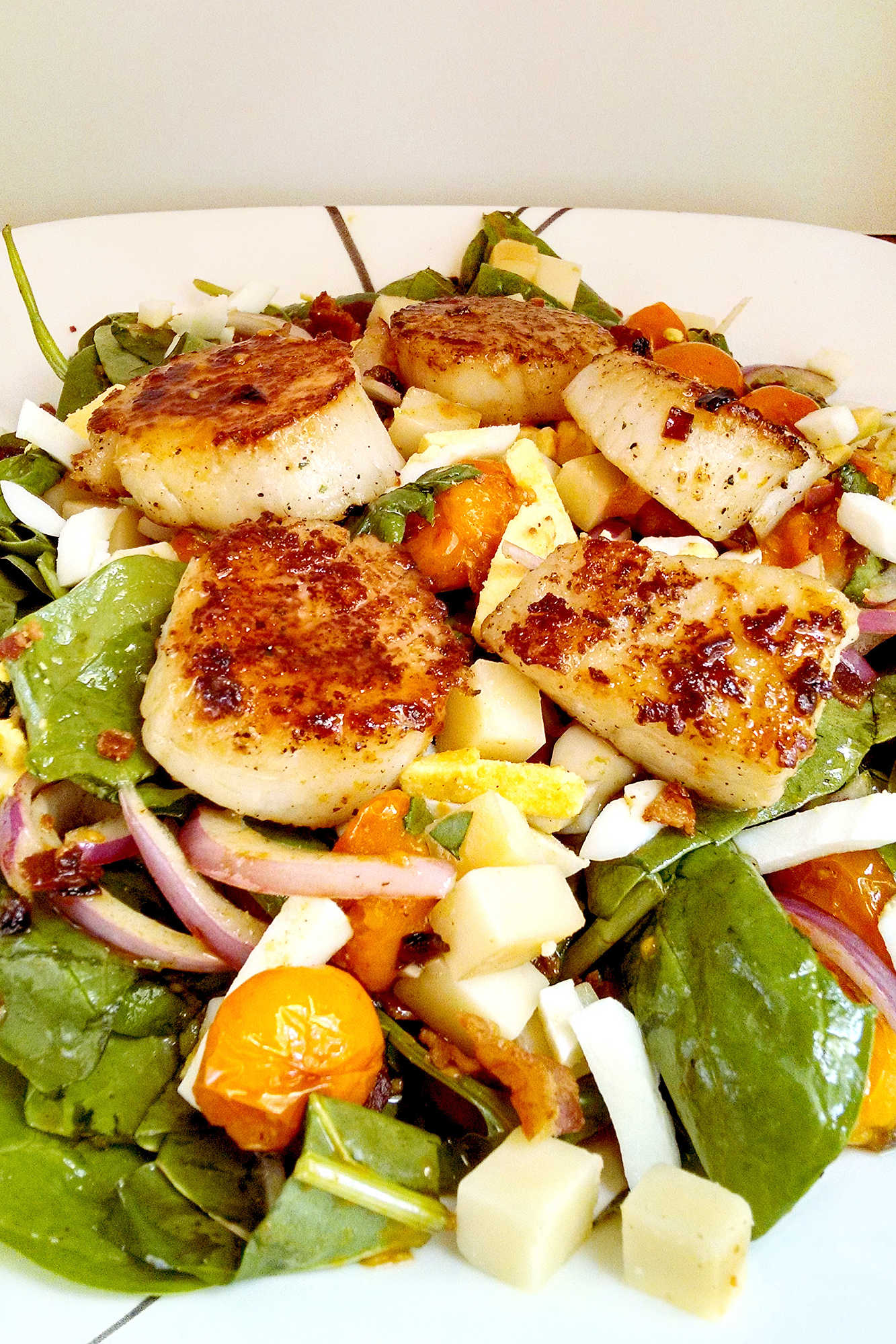 Upgrade your routine with Blistered Tomato Salad with Pan Seared Scallops. This quick, restaurant-worthy dish fits easily into busy lifestyles while offering bright and satisfying flavors.  #saladlove #scallopsfordays #foodiefinds #summerfood #seafoodlovers #saladgoals #TomatoSaladGoals #SeafoodLoverEats #ScallopsandGreens #HealthyFoodieFinds #SummerSaladCravings
