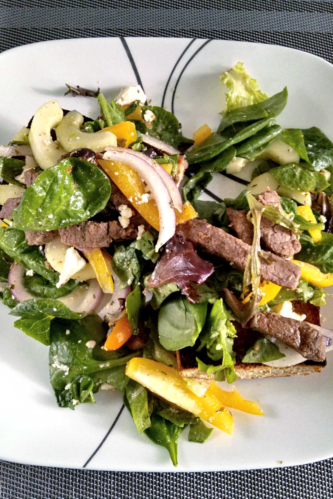 Elevate your pizza game with our Greek Steak Salad French Bread Pizza! Juicy steak, tangy feta, and crisp veggies on a golden crust. Who needs a salad on the side? #spicyfoodlovers #asiancuisine #porkstirfry #homecookingadventures #flavorfuldelights #PizzaLovers #GreekFlavors #Foodie #BestOfBothWorlds #PizzaAndSalad #PizzaParty #HealthyEating #MediterraneanDelight #GreekSteakSalad #FoodieFaves #PizzaPerfection #MediterraneanEats #FrenchBreadLove