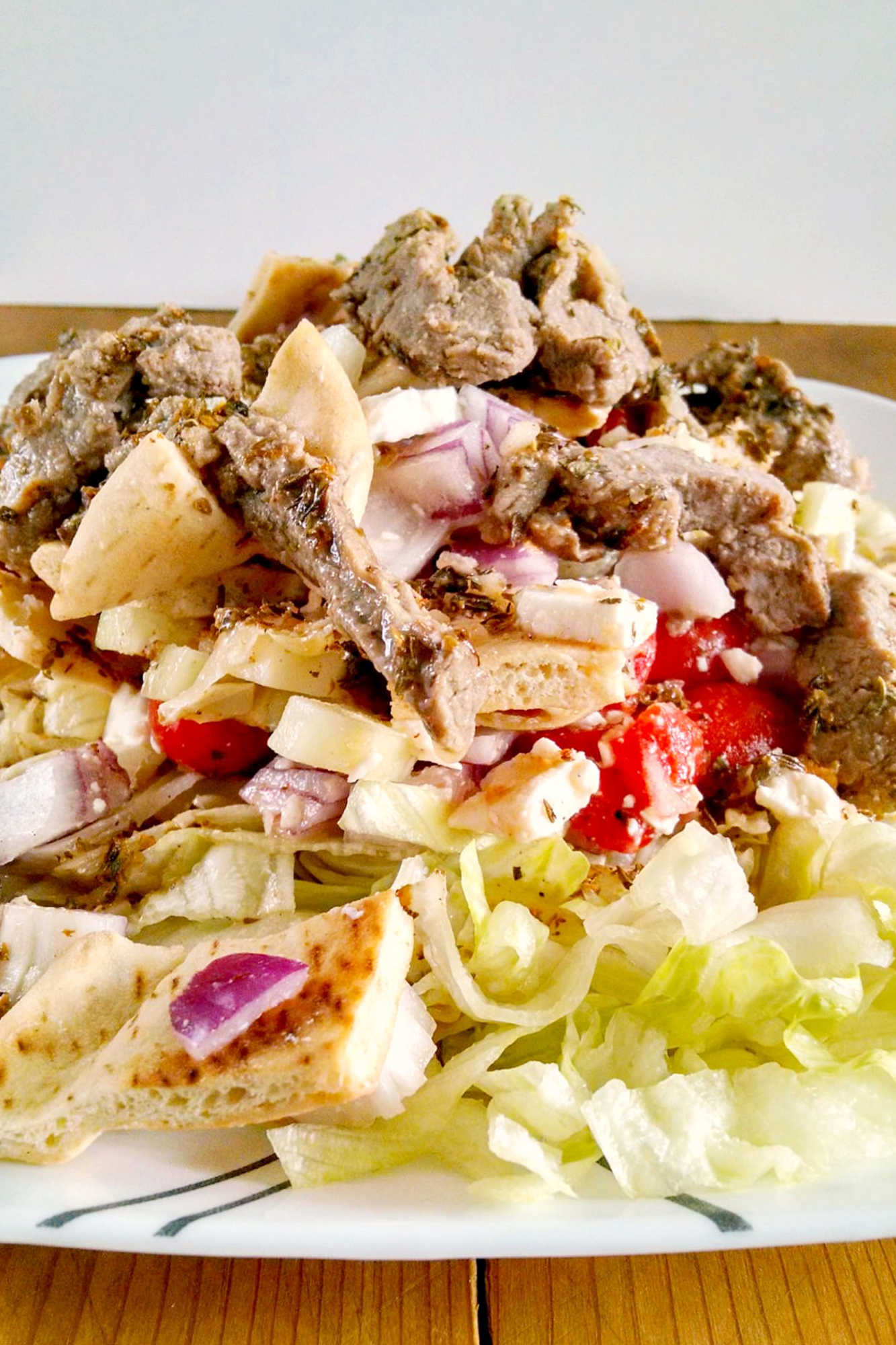 Spice up your salad game with a Pita Panzanella Salad with Steak! Juicy steak, fresh veggies, and a tangy dressing make for a mouthwatering meal. #PitaPanzanellaSalad #SteakSalad #HealthyEats #FoodieFavorites #CarnivoreCravings #SaladGoals #PitaPanzanella #SteakLovers #SaladLovers #MediterraneanEats #ForkAndKnifeDiaries