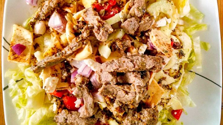 Spice up your salad game with a Pita Panzanella Salad with Steak! Juicy steak, fresh veggies, and a tangy dressing make for a mouthwatering meal. #PitaPanzanellaSalad #SteakSalad #HealthyEats #FoodieFavorites #CarnivoreCravings #SaladGoals #PitaPanzanella #SteakLovers #SaladLovers #MediterraneanEats #ForkAndKnifeDiaries