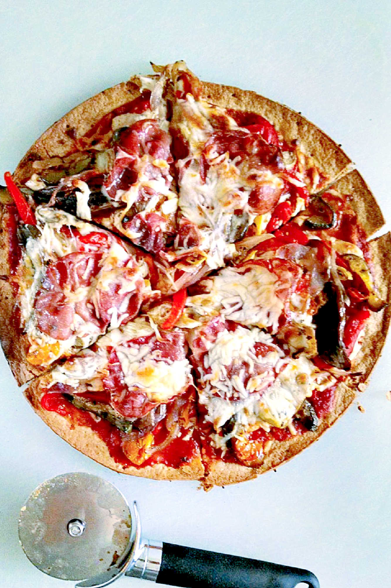 Looking for a flavorful and colorful pizza? Look no further than our Capicola Roasted Veggie Pizza! Savor the deliciousness of roasted veggies, savory capicola, and gooey cheese. #MeatlessMondayPizza #PizzaLoversUnite #PizzaCraze #PizzaLoversUnite #RoastedVeggieDelight #CapicolaCravings #FoodieFaves #InstaPizzaGuru