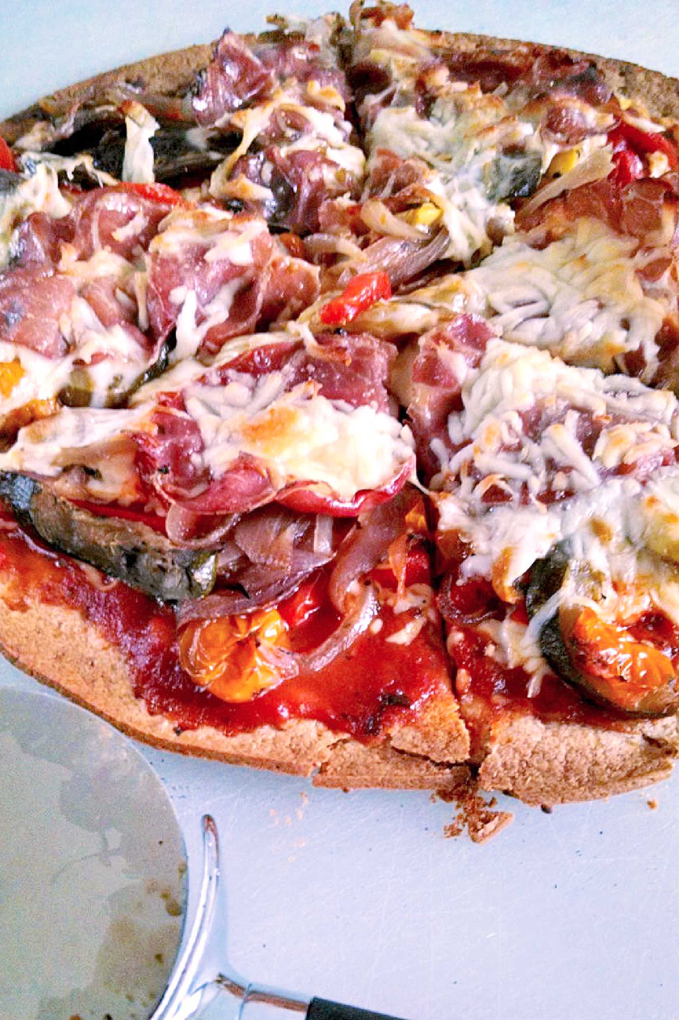 Looking for a flavorful and colorful pizza? Look no further than our Capicola Roasted Veggie Pizza! Savor the deliciousness of roasted veggies, savory capicola, and gooey cheese. #MeatlessMondayPizza #PizzaLoversUnite #PizzaCraze #PizzaLoversUnite #RoastedVeggieDelight #CapicolaCravings #FoodieFaves #InstaPizzaGuru