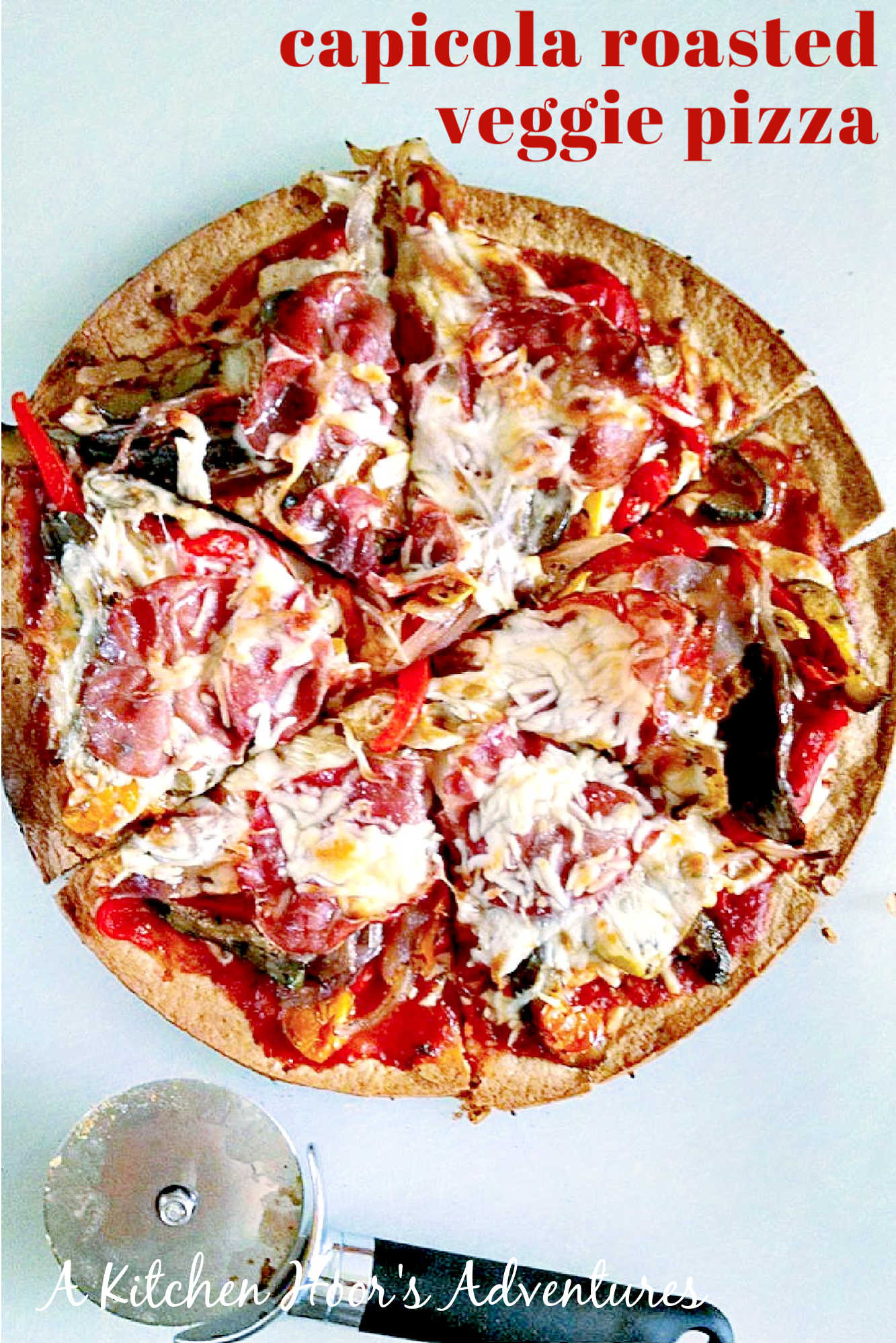 Looking for a flavorful and colorful pizza? Look no further than our Capicola Roasted Veggie Pizza! Savor the deliciousness of roasted veggies, savory capicola, and gooey cheese. #MeatlessMondayPizza #PizzaLoversUnite #PizzaCraze #PizzaLoversUnite #RoastedVeggieDelight #CapicolaCravings #FoodieFaves #InstaPizzaGuru